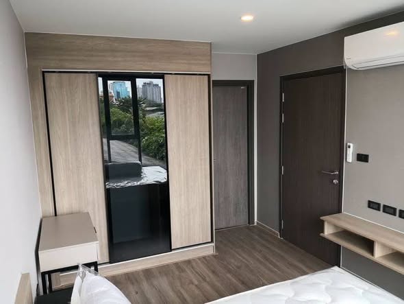 bedroom and room interior of The TEAK Sukhumvit 39