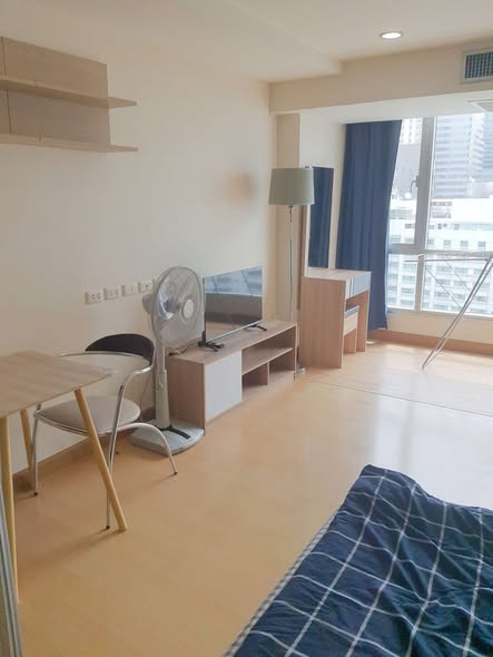 bedroom of The Trendy Condominium
