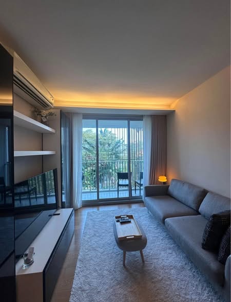 living room and bedroom of VIA 31 Condo
