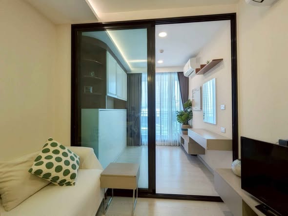 bedroom and living room and room interior of VTARA36 Condominium