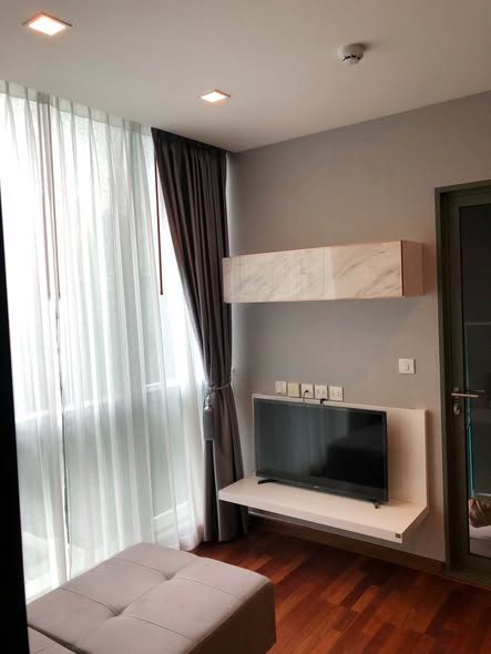 living room and bedroom of Wish Signature II Midtown Siam