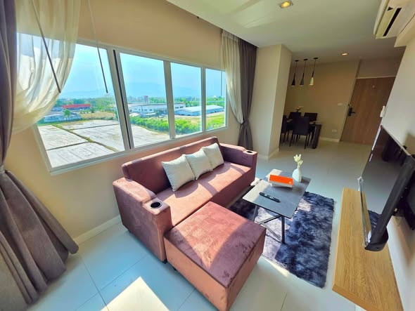 living room and bedroom of 103 Central condominium