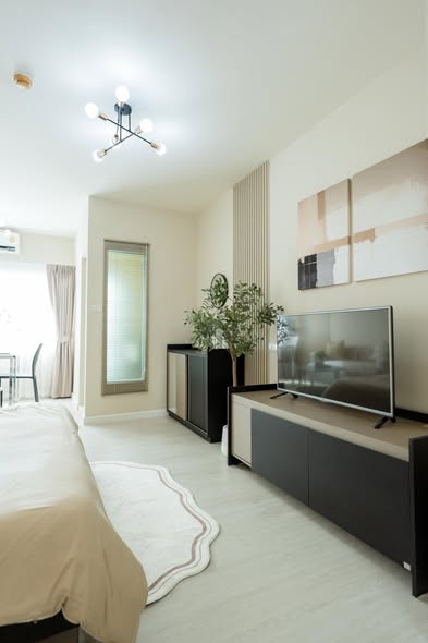 living room and bedroom of A Space ME Sukhumvit 77