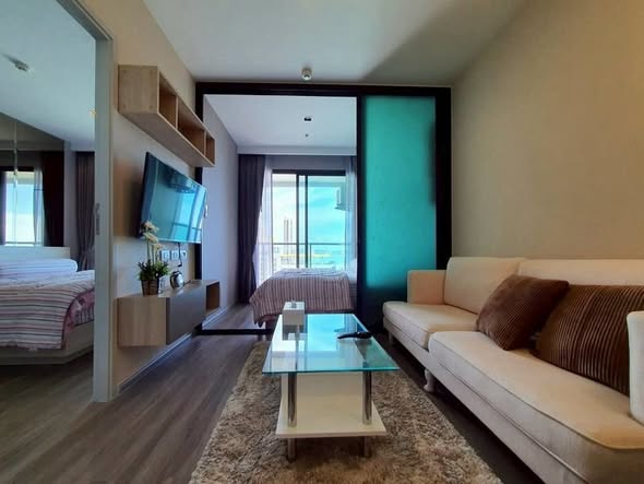 living room and bedroom of AERAS Beachfront Condominium Jomtien Pattaya