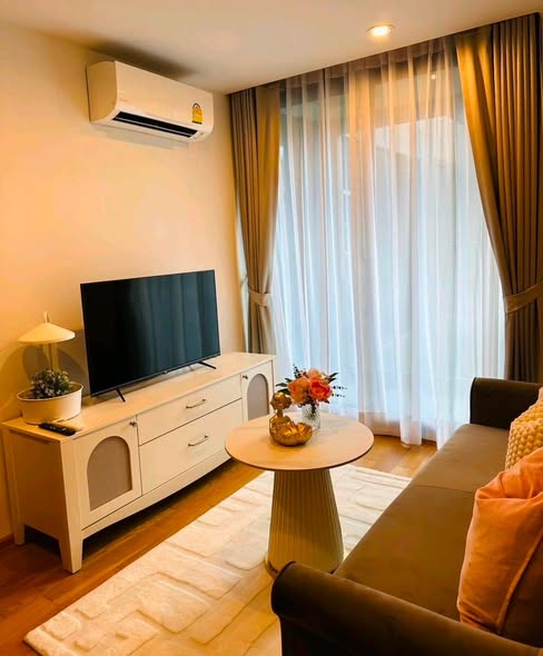 bedroom and living room of Altitude Sam Yan – Si Lom
