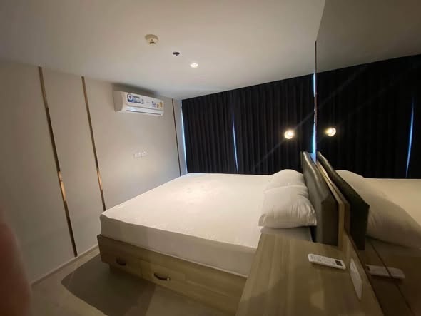 bedroom of Altitude Unicorn Sathorn