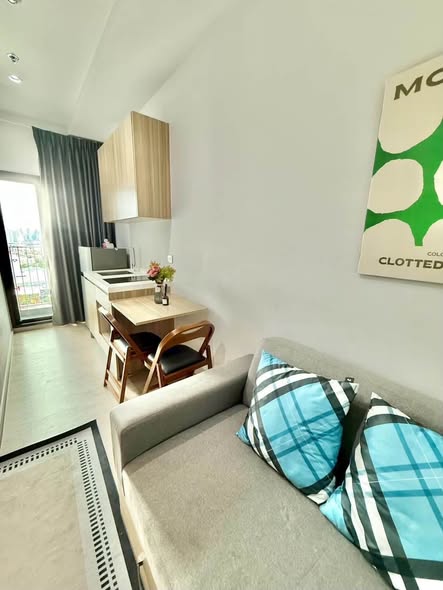 bedroom and living room of Altitude Unicorn Sathorn