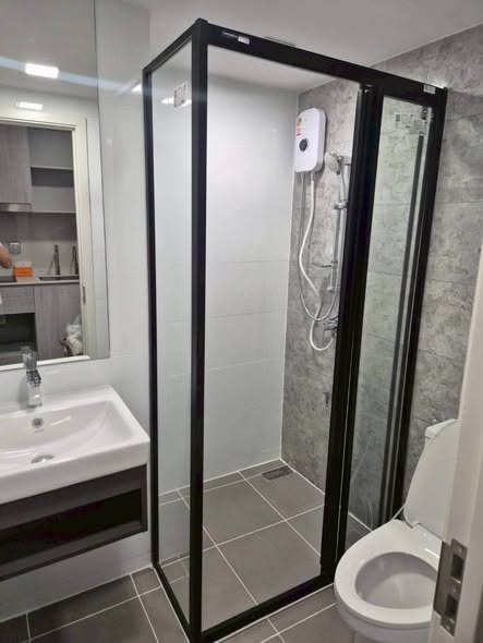 room interior and bathroom of Atmoz Tropicana Bangna