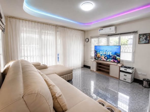 living room and bedroom of Baan Fah Greenery Loft North Pattaya