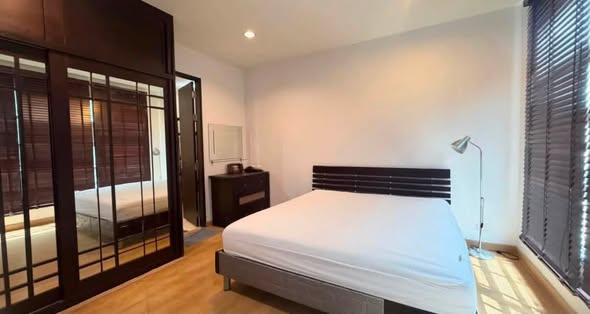 bedroom and room interior of Baan Klang Krung Siam-Pathum Wan