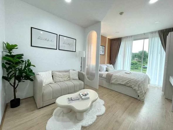 living room and bedroom of Best Point Condominium