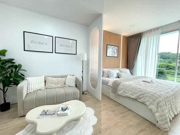 living room and bedroom of Best Point Condominium