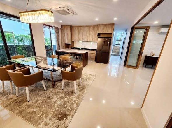 living room and kitchen of Burasiri Krungthep Kreetha