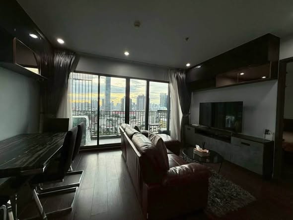 bedroom and living room of C Ekkamai Condominium