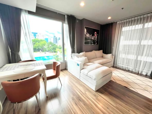 bedroom and living room of CEIL By Sansiri