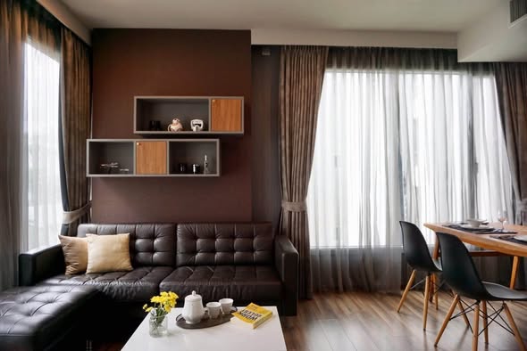 bedroom and living room of CEIL By Sansiri