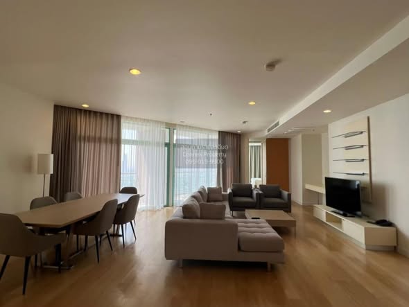 living room and room interior of Chatrium Hotel Riverside Bangkok
