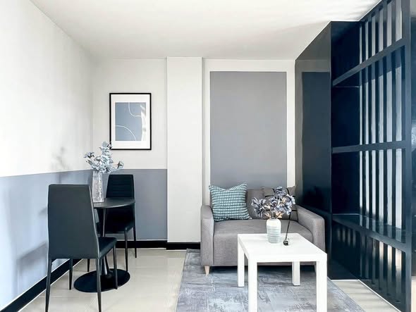 living room and room interior of Condo The Cache Rama 3 – Samrong