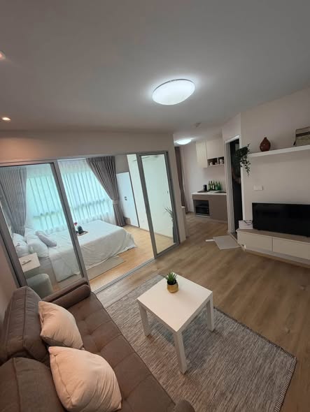 living room and bedroom of D Condo Rattanathibet