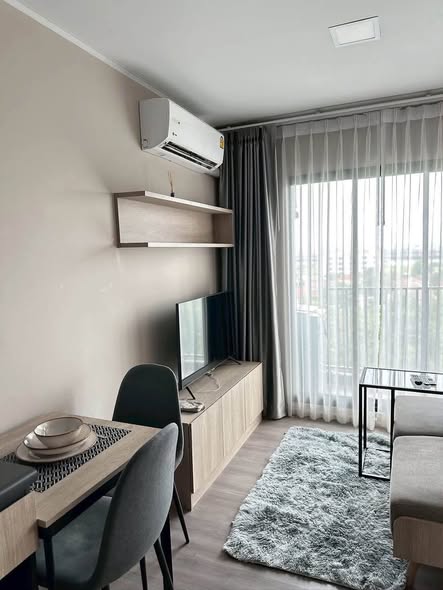 bedroom and living room of dcondo Campus Hideaway