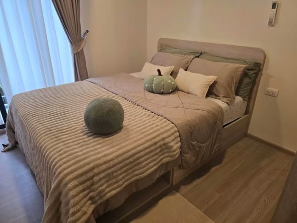 bedroom of dcondo Reef Phuket