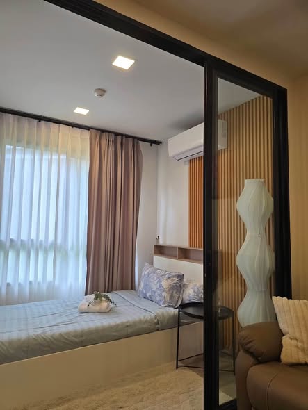 bedroom and room interior of dcondo Reef Phuket