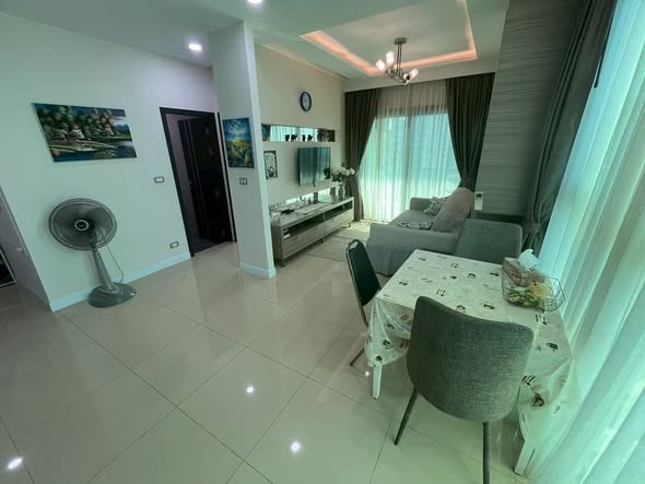 living room and bedroom of Dusit Grand Condo View