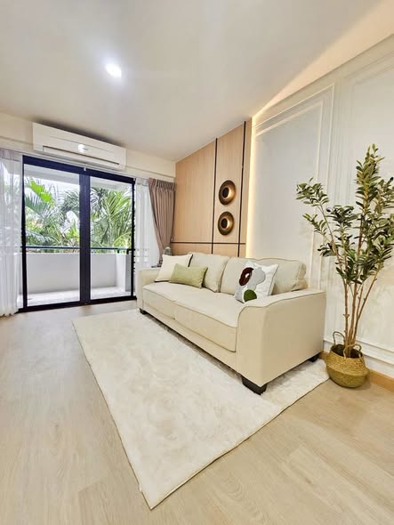 bedroom and living room of Eastwood Park Condominium