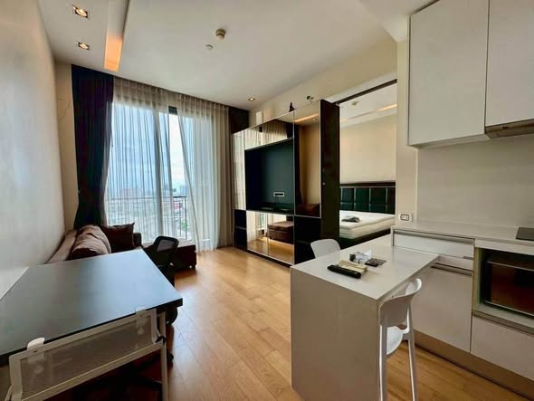 living room and kitchen of Equinox Phahol Vibha