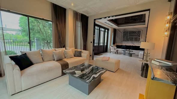 living room and bedroom of Grand Bangkok Boulevard Sukhumvit – Srinakarin