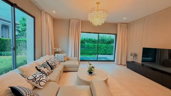 living room and bedroom of Grand Bangkok Boulevard Sukhumvit – Srinakarin