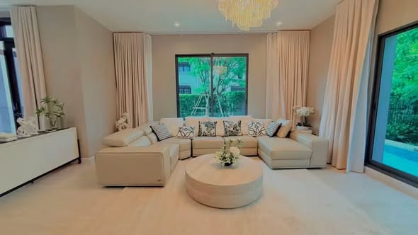 living room and bedroom of Grand Bangkok Boulevard Sukhumvit – Srinakarin