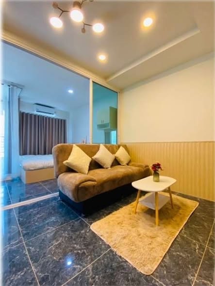 living room and bedroom of Green Tower