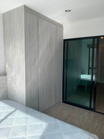 bedroom and room interior of HI SEACON STATION – Condominium