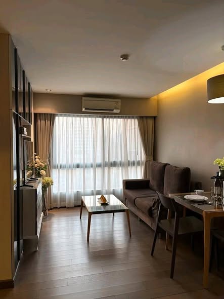 living room and bedroom of Hof Udom Suk