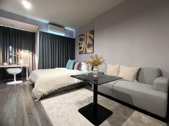 bedroom and living room of IDEO Chula-Sam Yan