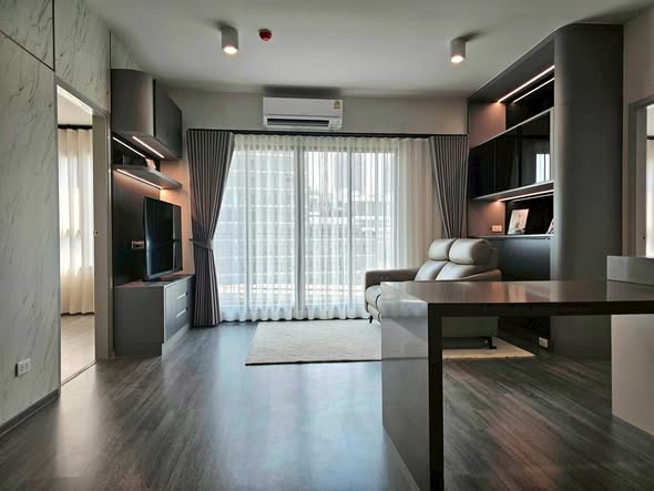 living room and bedroom of IDEO Chula-Sam Yan