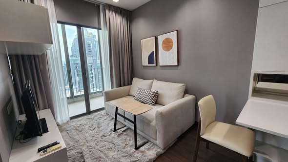 living room and bedroom of Ideo Q Phaya Thai