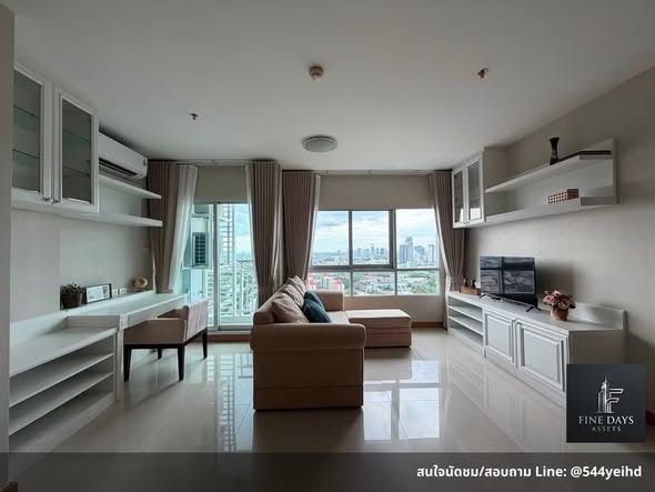 bedroom and living room of IVY River Condo