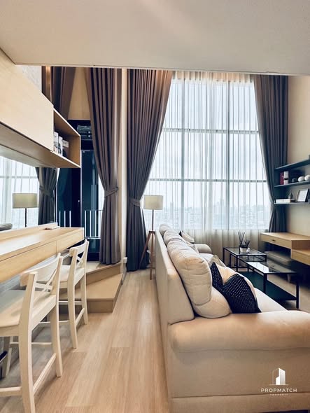 living room and bedroom of KnightsBridge Prime Sathon