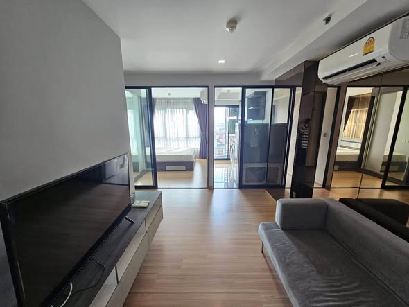 living room and bedroom and room interior of KnightsBridge Sky City
