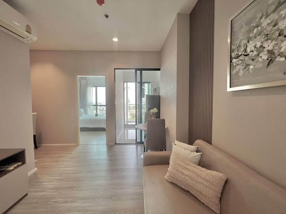bedroom and living room of Knightsbridge Sky River Ocean Condominium