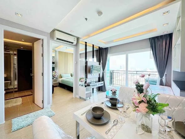 bedroom and living room of La Santir Condominium