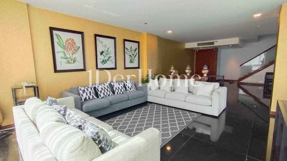 bedroom and living room of Le Raffine Jambunuda Sukhumvit 31