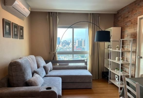 bedroom and living room of Le Rich Condo