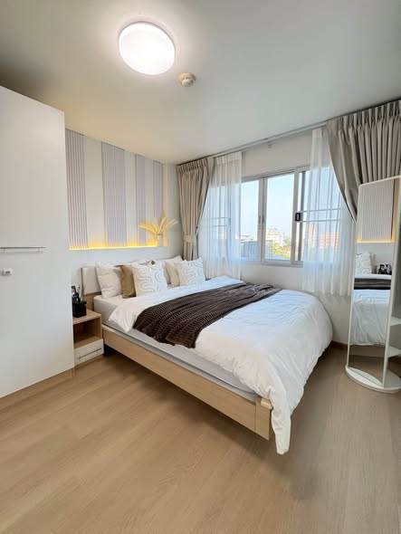 bedroom of Lumpini Condo Town Bodindecha-Ramkhamhaeng