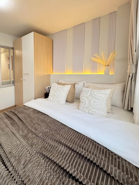bedroom of Lumpini Condo Town Bodindecha-Ramkhamhaeng