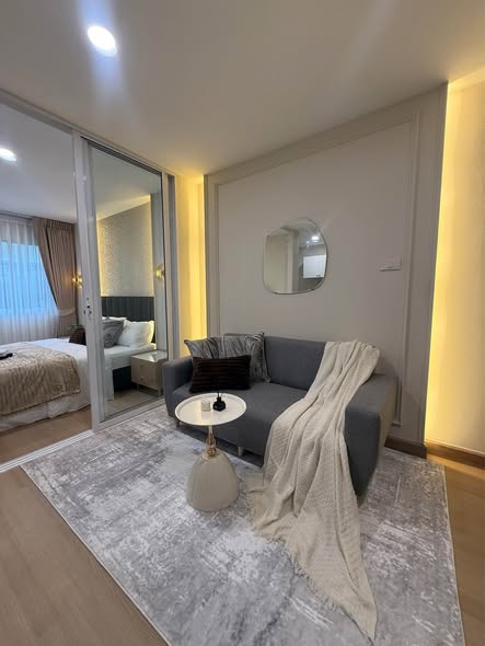 living room and bedroom of Lumpini Condo Town Bodindecha-Ramkhamhaeng