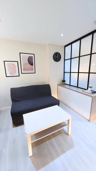 bedroom and living room of Lumpini Suite Sukhumvit 41
