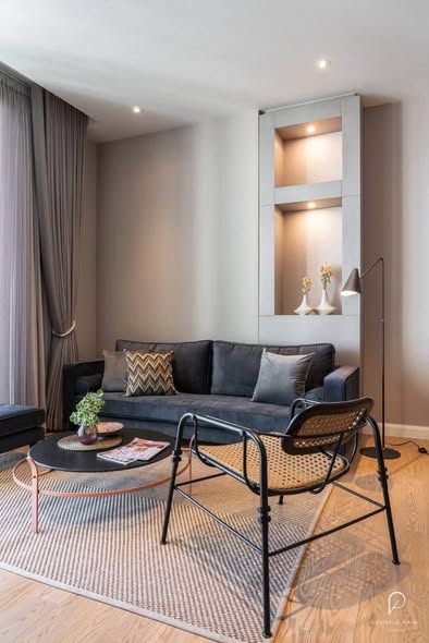 bedroom and living room of Magnolias Waterfront Residences